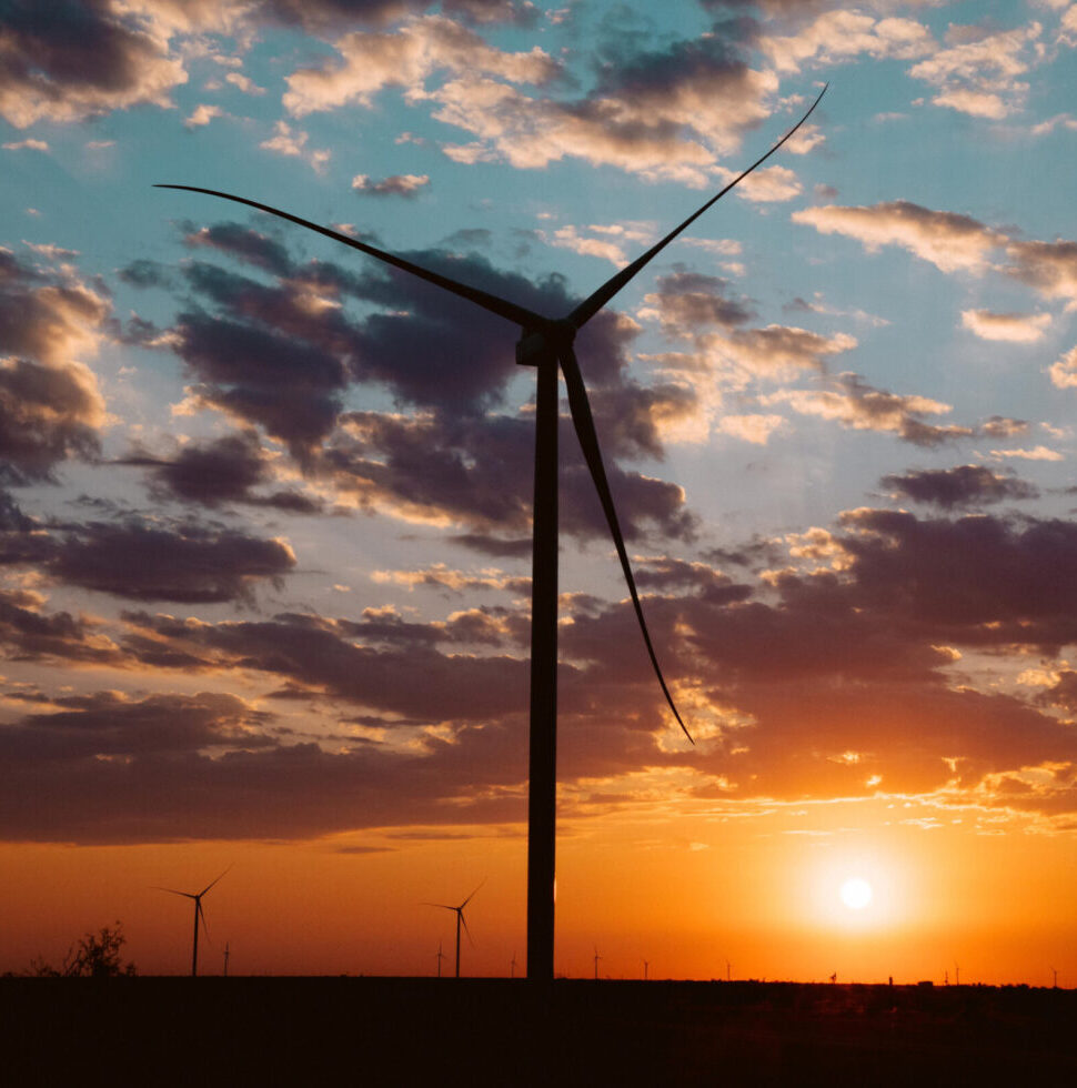 Wind turbine at sunset