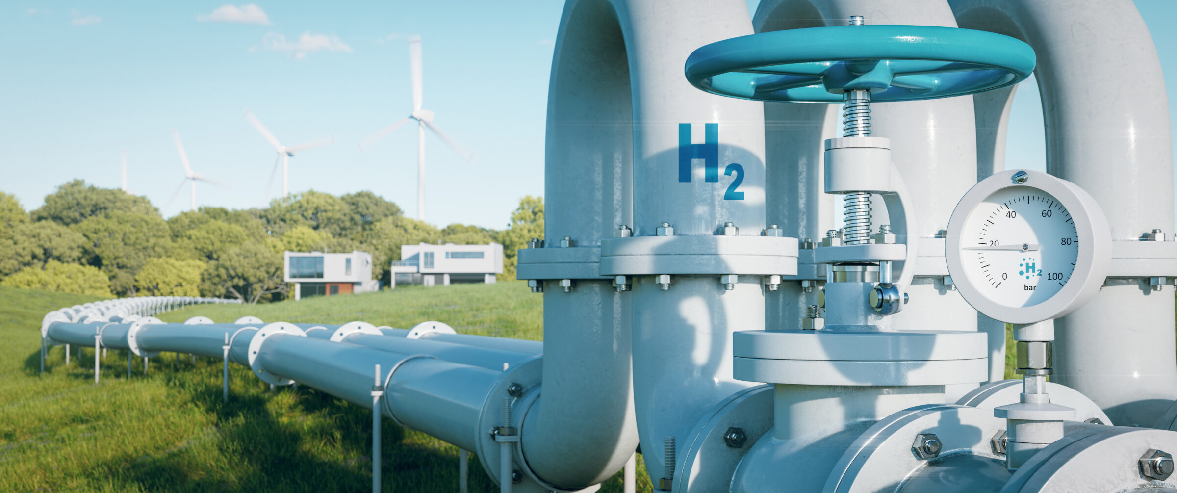 A long aboveground hydrogen pipeline recedes to the distance in a grassy field.