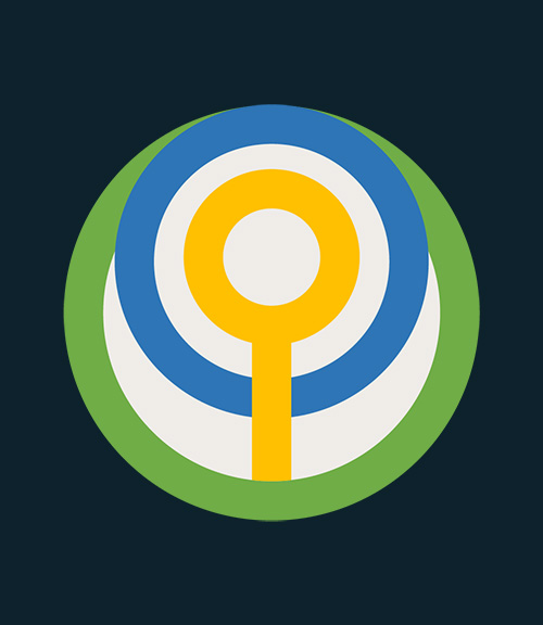 Circular badge of a magnifying glass icon